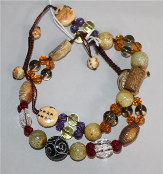 Two Japanese bracelets.